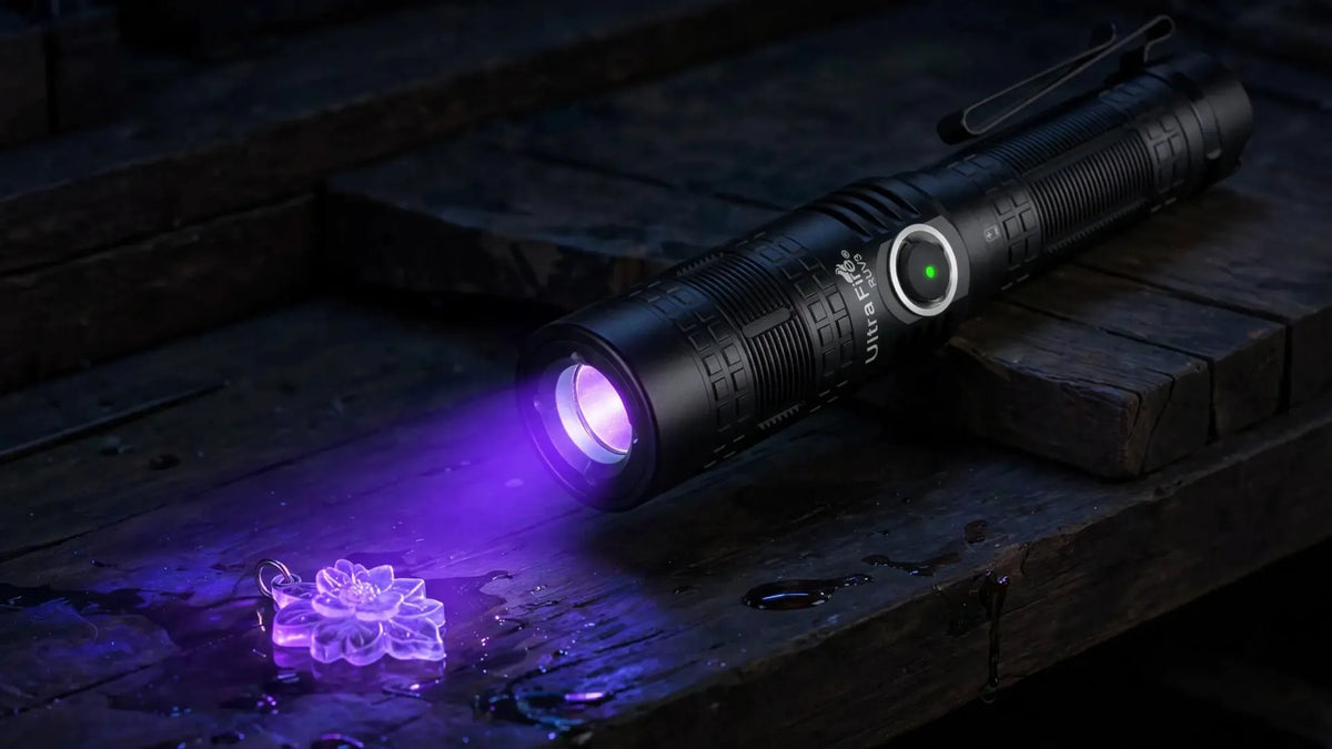 UltraFire RUV3 UV flashlight curing a resin flower pendant on a dark workbench